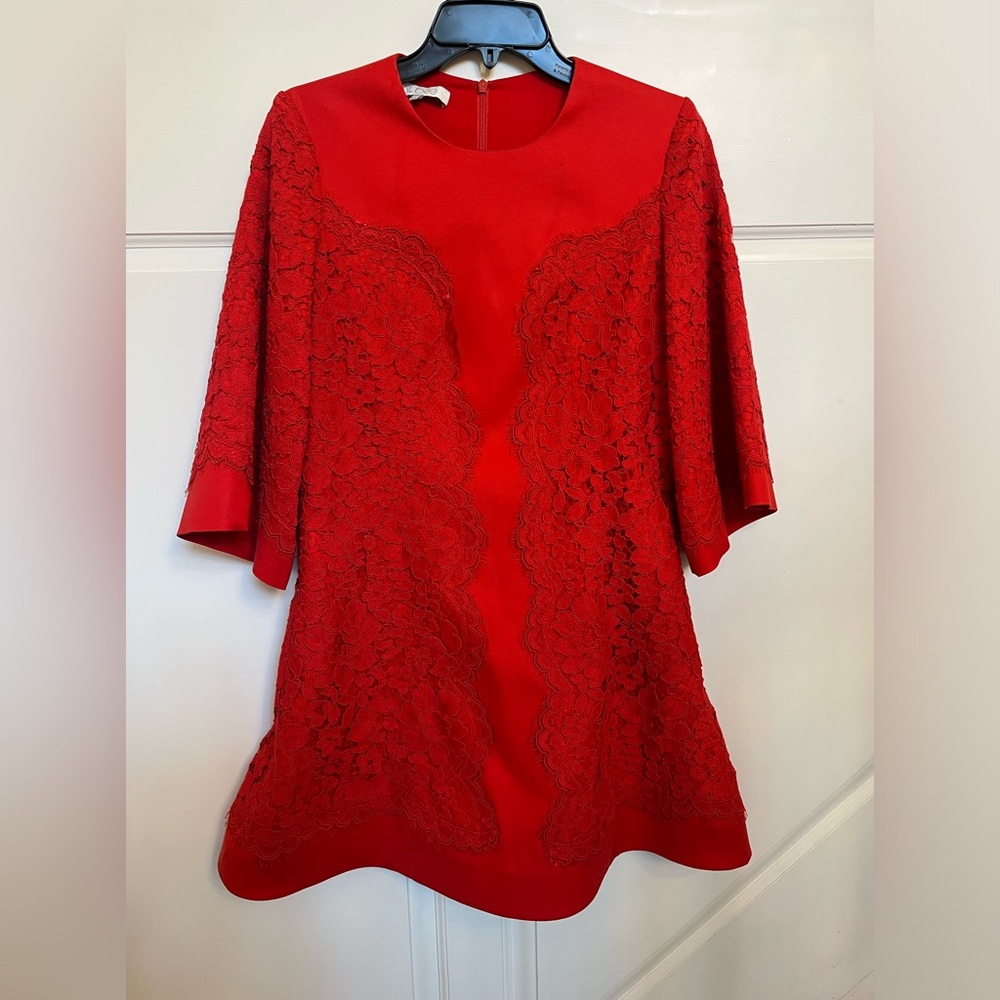Alexis red wool cotton lace dress with bell sleeves. Slight mark on fabric